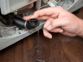 Как слить воду из стиральной машины автомат?