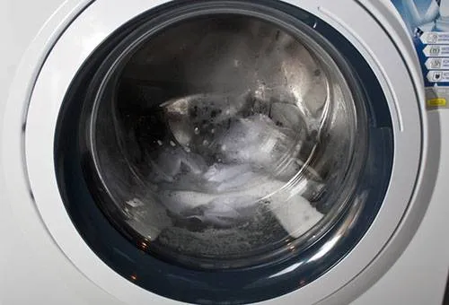 как слить воду из стиральной машины