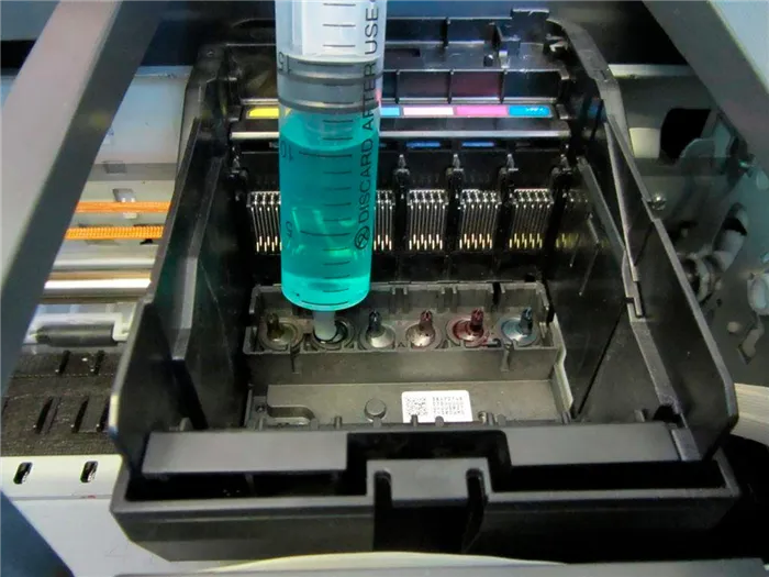 Прочистка головки принтера